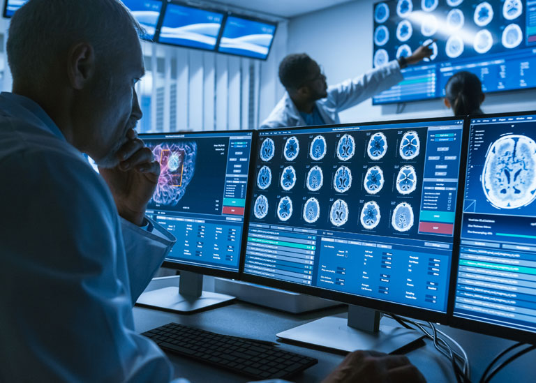 Physician working with Working with CT Brain Scan Images